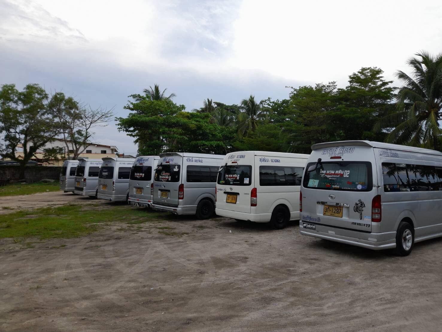 Fleet of Khao Lak Welcome vans lined up and ready for service